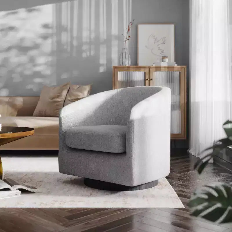 Fauteuil club capitonné avec pivotement à 360 degrés et accoudoirs inclinés
